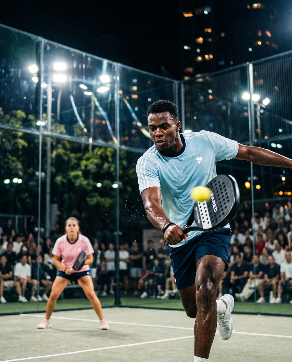 PARED Serve Tee — couple wearing Sky Blue and Pink padel tees, mixed doubles